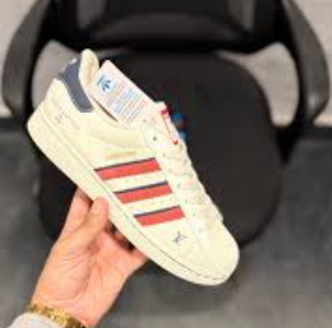 Adidas Superstar sneakers featuring Louis Vuitton