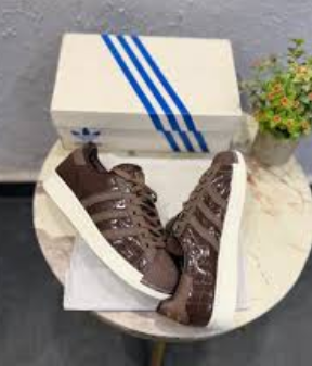 brown Adidas Superstar sneakers