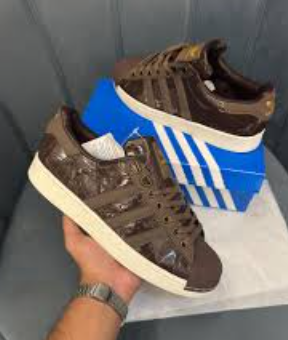 brown Adidas Superstar sneakers