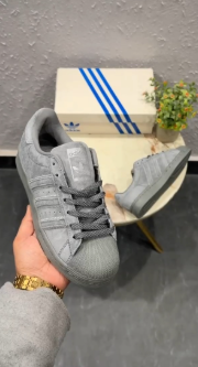 Adidas Originals Superstar Suede Grey sneaker for men.