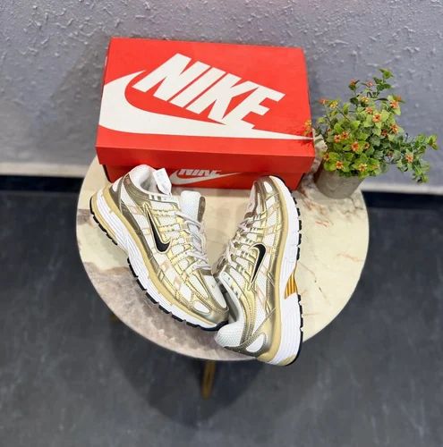 NIKE P-6000 TRAINER METALLIC GOLD