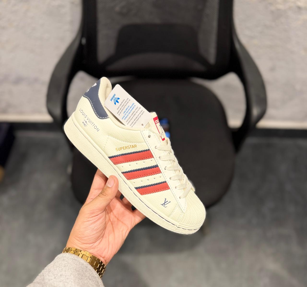 Adidas Superstar sneakers featuring Louis Vuitton
